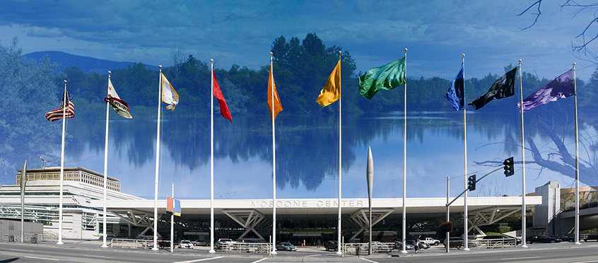 Moscone Center Flags Against Mountain Backdrop