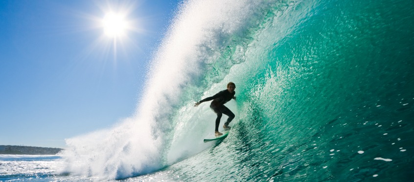 Surfer Riding a Large Ocean Wave